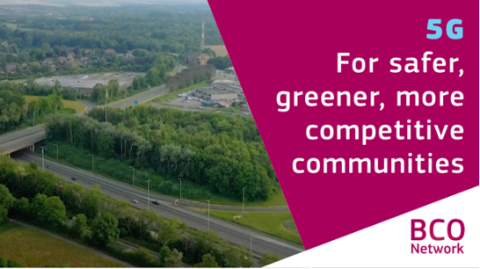 Text over photo of an aerial photograph of the municipality of Wavre in Belgium, showing wide roads and a bridge leading to the city’s outskirts, surrounded by forests and fields: “5G: for safer, greener, more competitive communities”.