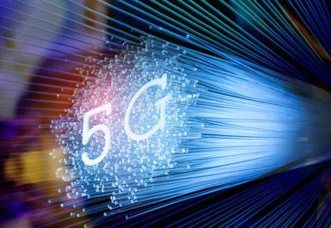 5G sign with fiber optics background